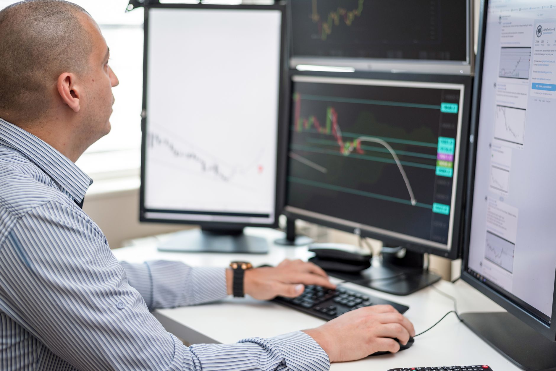 close-up of a brokerage account statement on a desktop monitor showing a trade confirmation with settlement date fields highlighted