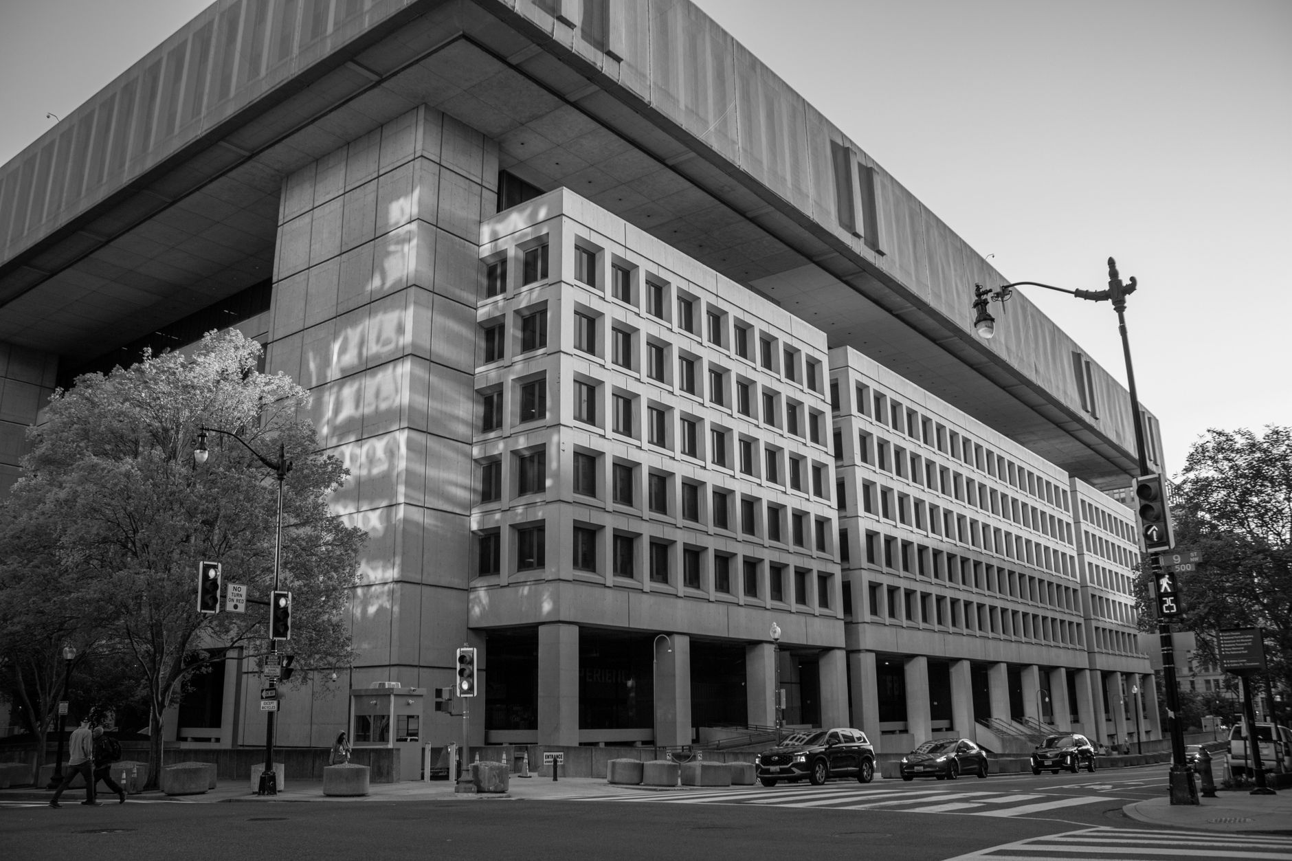 exterior of the U.S. Bureau of Labor Statistics headquarters in Washington D.C. on an overcast morning, with a stone facade and federal signage visible