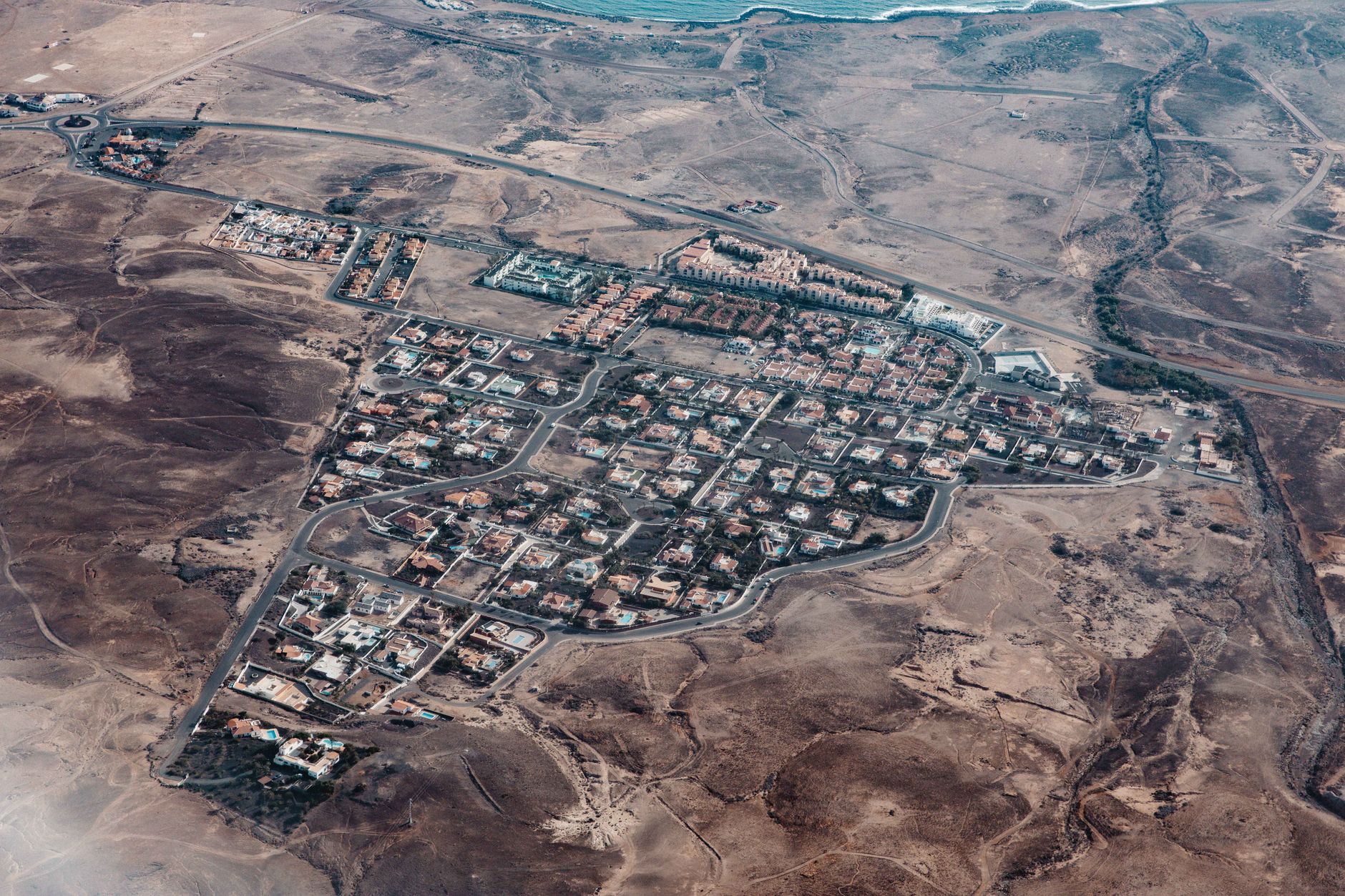 Aerial view of the Natanz nuclear facility complex surrounded by arid desert terrain in central Iran, captured from a high altitude