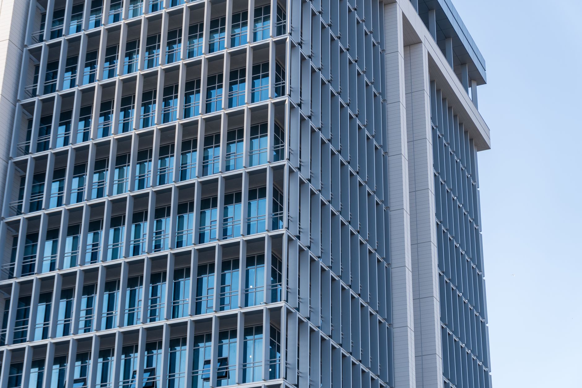 exterior of the Israeli Finance Ministry building in Jerusalem, stone facade under a clear blue sky