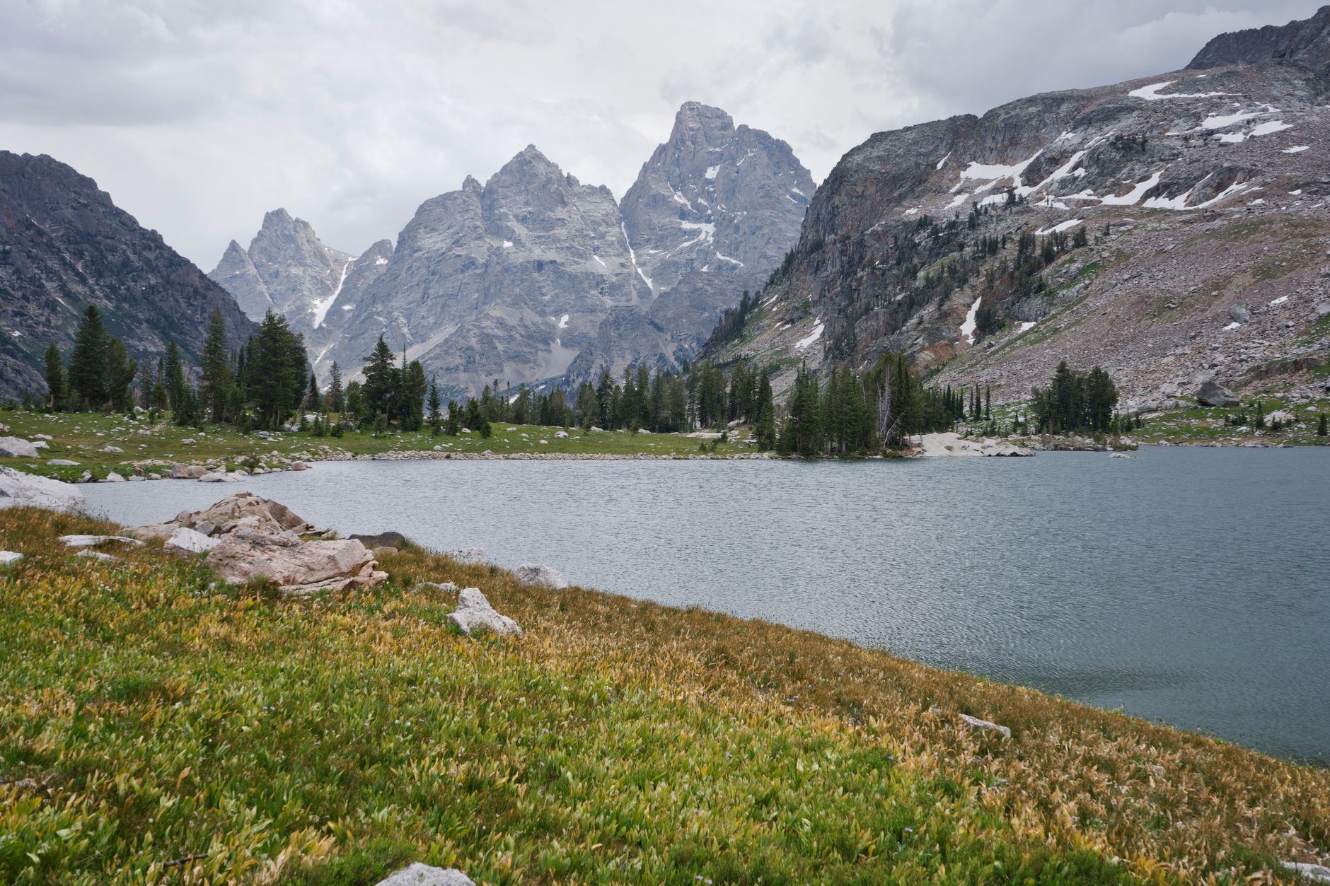 exterior view of the Jackson Lake Lodge at Grand Teton National Park, the traditional venue for the Federal Reserve's annual economic symposium, under a late-summer sky