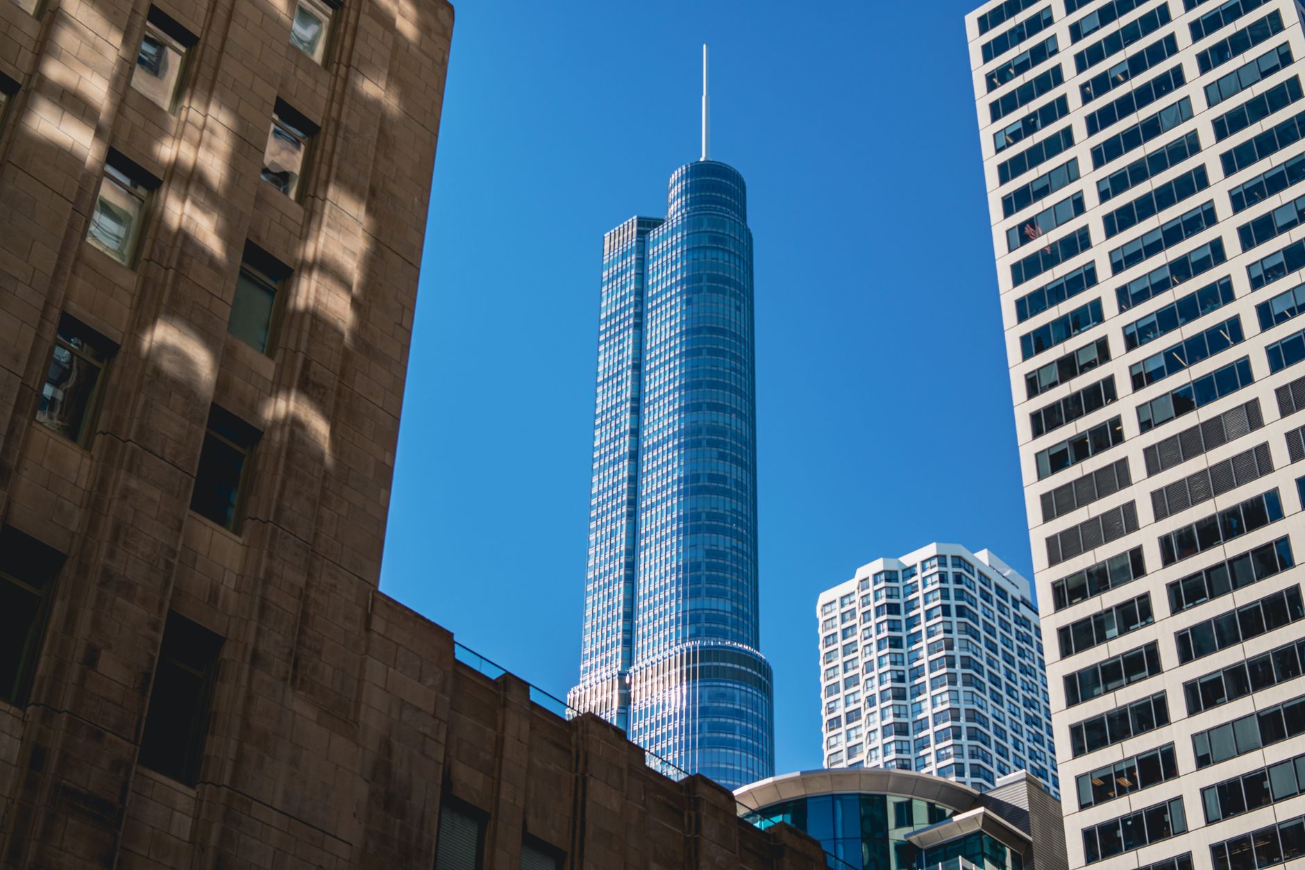 exterior of the Cboe Global Markets headquarters building in Chicago's financial district on a clear morning, with the exchange's signage visible above the entrance