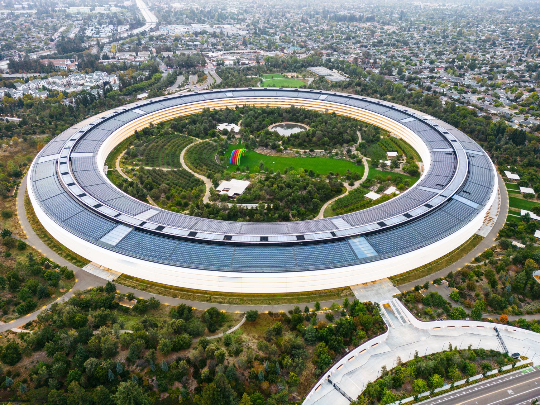 aerial view of a modern technology campus with glass office buildings and manicured grounds in Tel Aviv's central business district