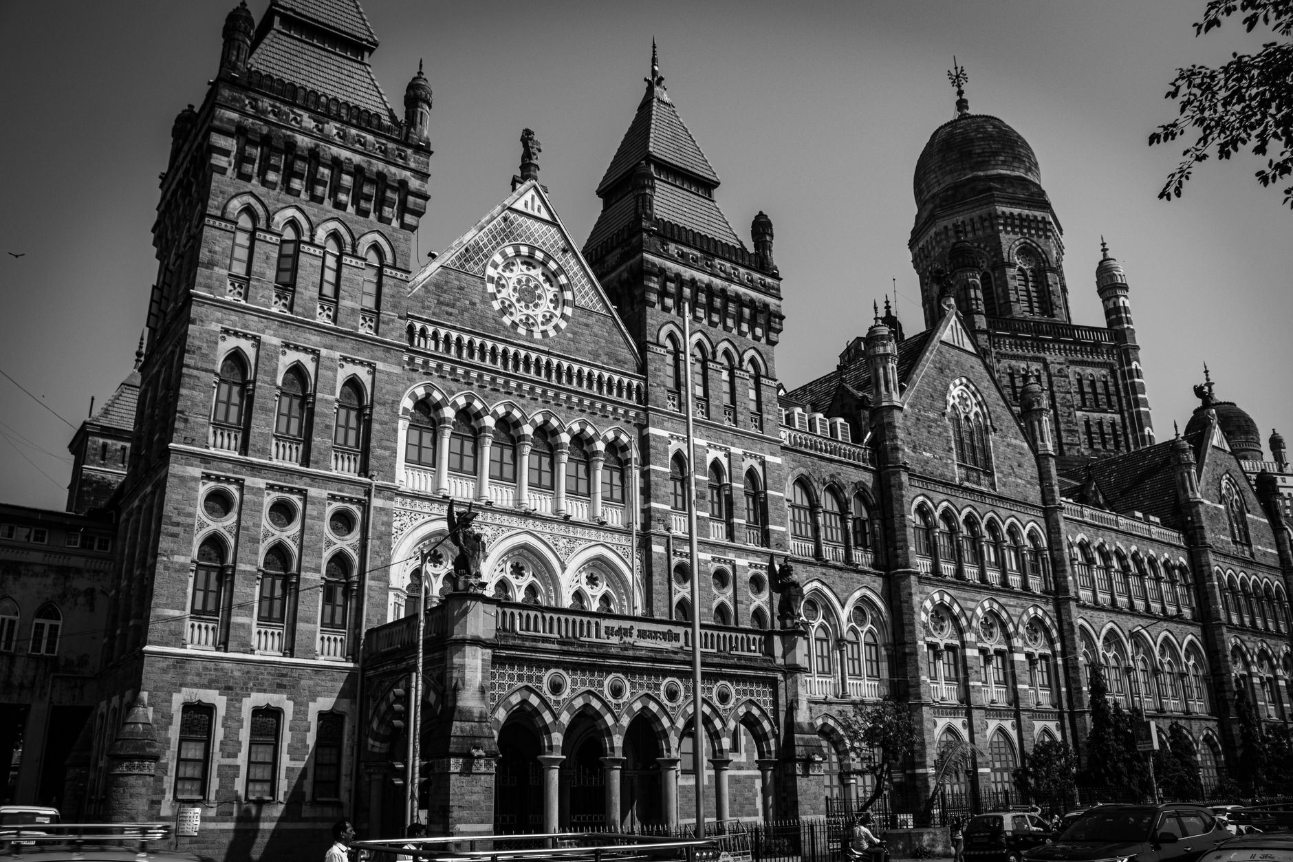 exterior of the Reserve Bank of India headquarters building in Mumbai, with its classical stone facade visible against an overcast sky